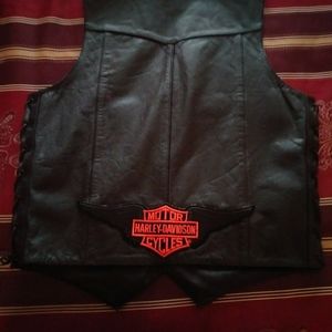 Set of 2. His and hers leather vests..new